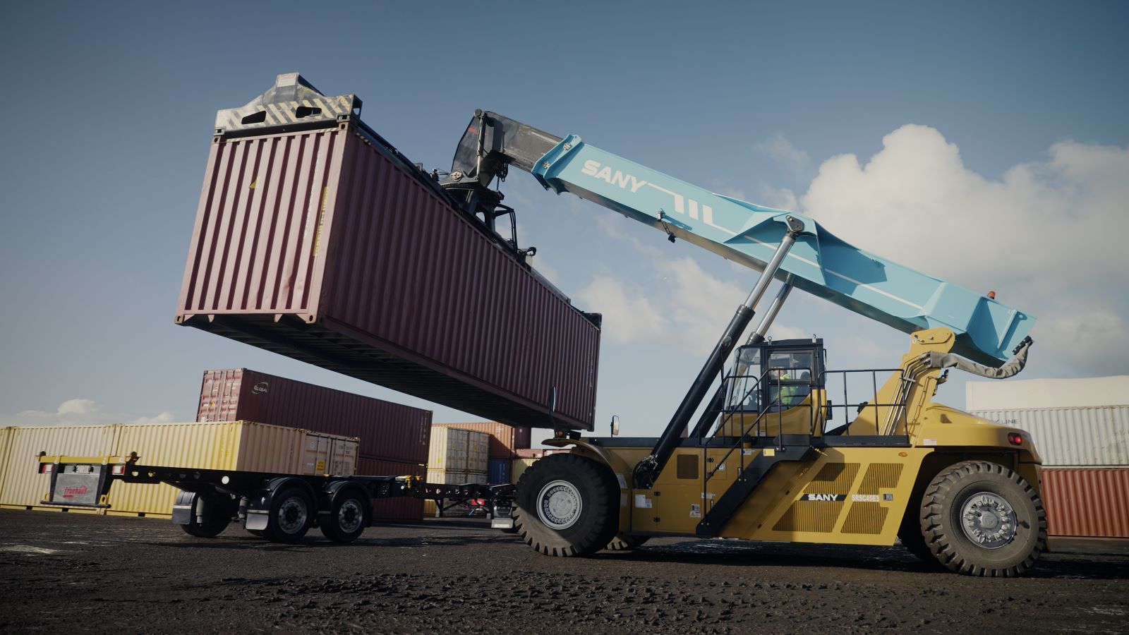 Reliance Transport's electric reach stacker in action..